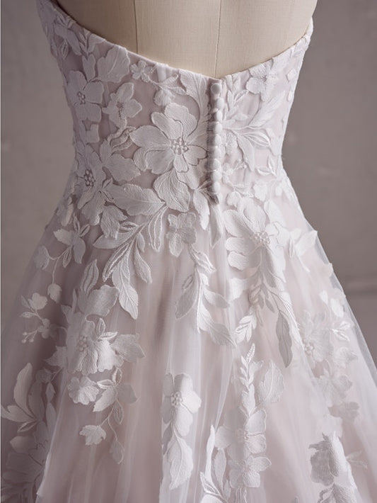 Whispers of Ivory - Blush-Kissed Lace Wedding Gown
