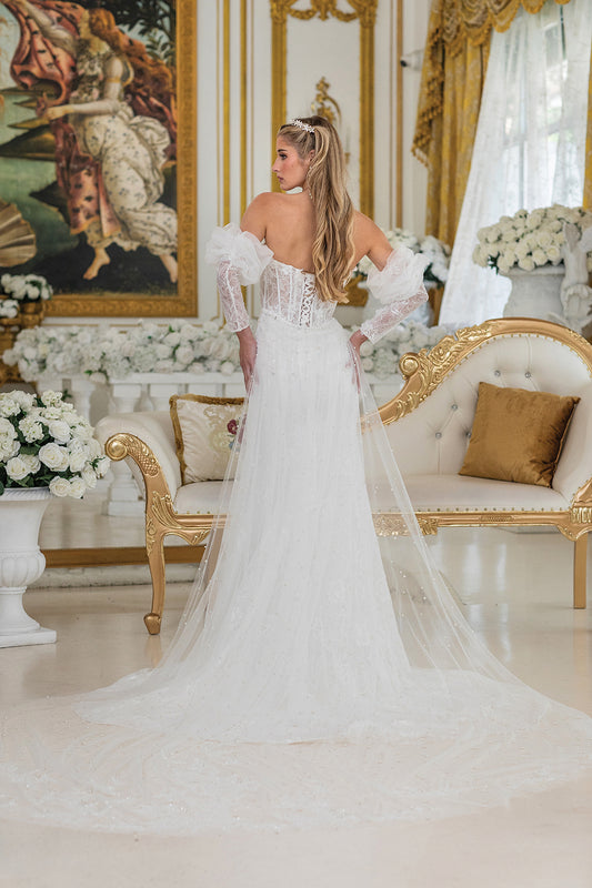 Rose Pearl Dream: Blush Wedding Gown with Pearl Embellishments