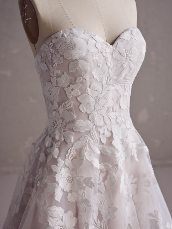 Whispers of Ivory - Blush-Kissed Lace Wedding Gown
